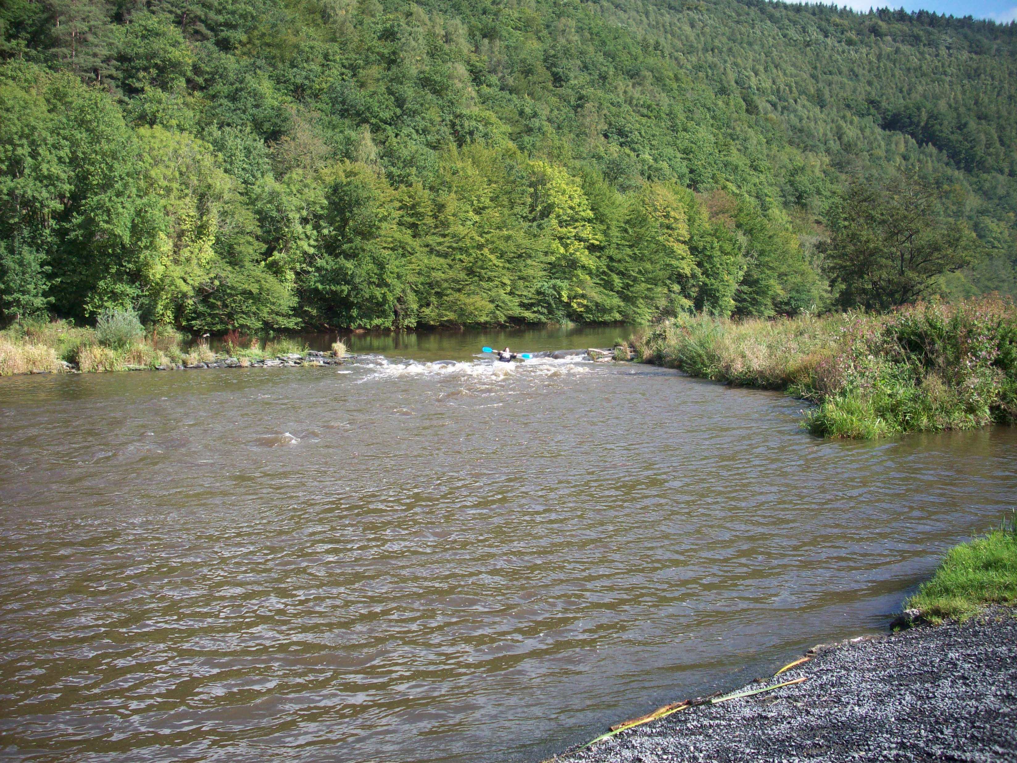 Panneau d'information historique sur les kayaks